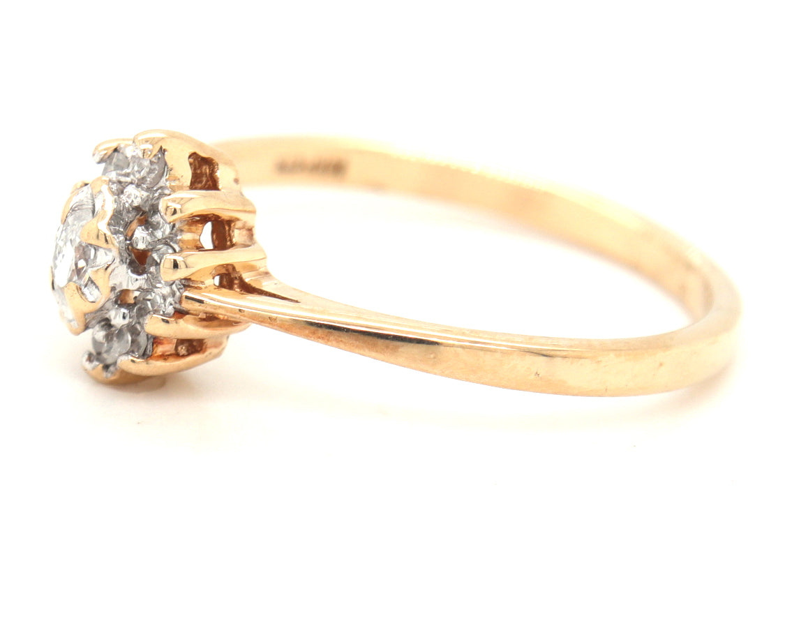 10kt Yellow gold 0.15ctw marquise and round brilliant cut diamond cluster ring