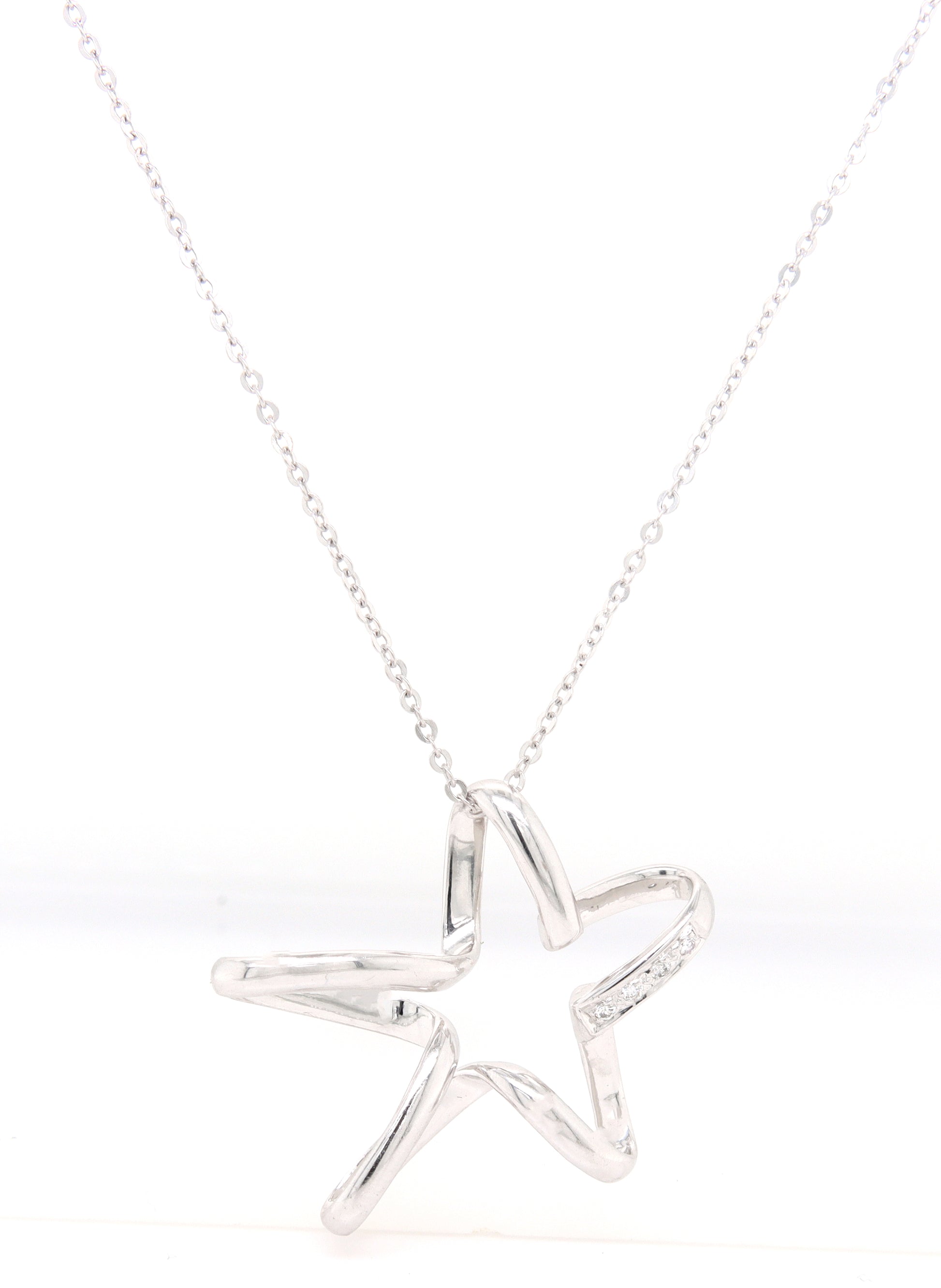 18kt White gold diamond accent free form star pendant on chain