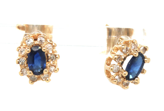 14kt Yellow gold oval sapphire and diamond halo earrings