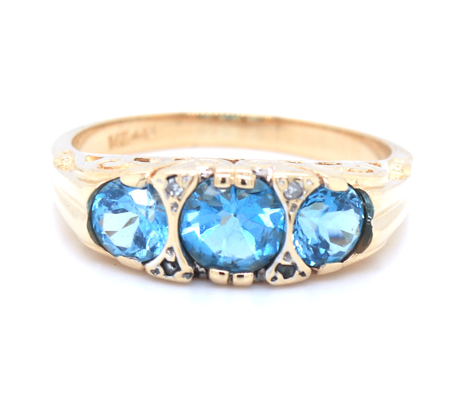 Vintage 14kt yellow gold 3 stone blue topaz and diamond accent ring