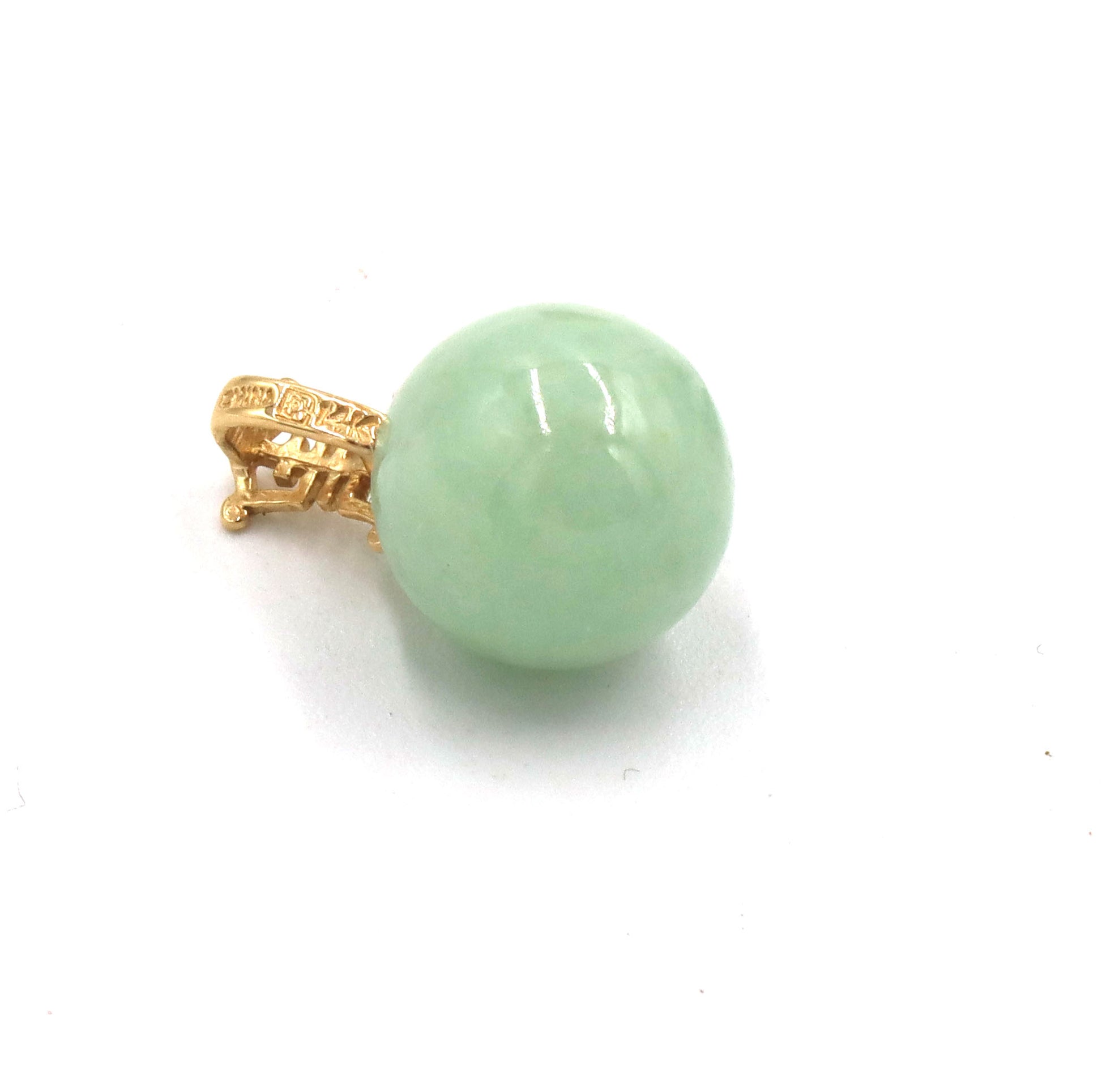 Lot of 14kt yellow gold green jade pendants