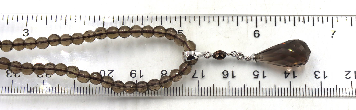 Pear shaped smokey quartz pendant on beaded necklace