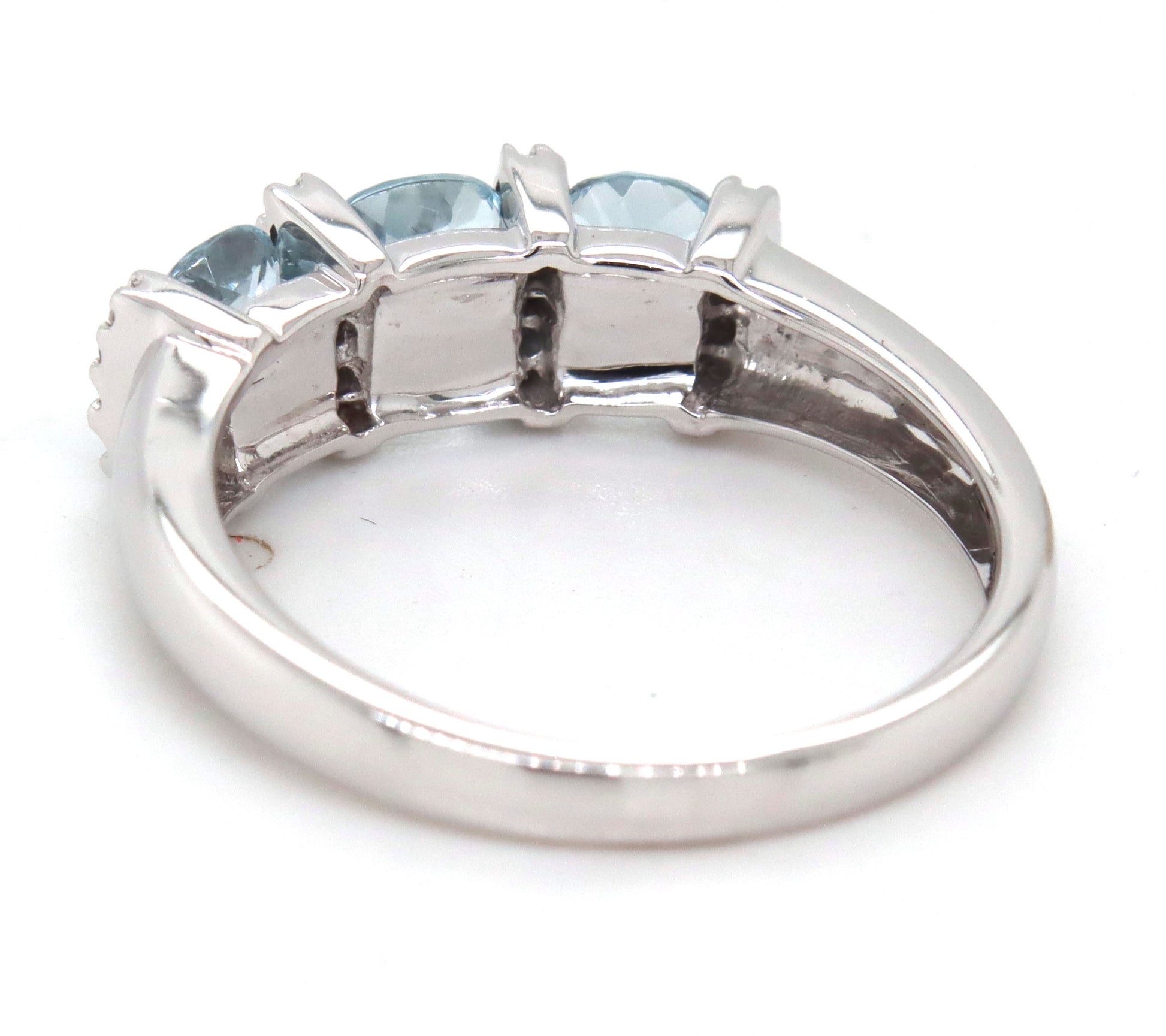 14kt White gold blue topaz and diamond ring