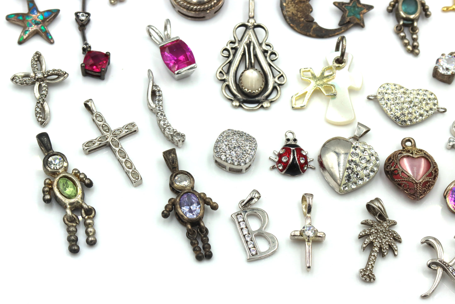 Lot of vintage 925 sterling silver pendants and charms