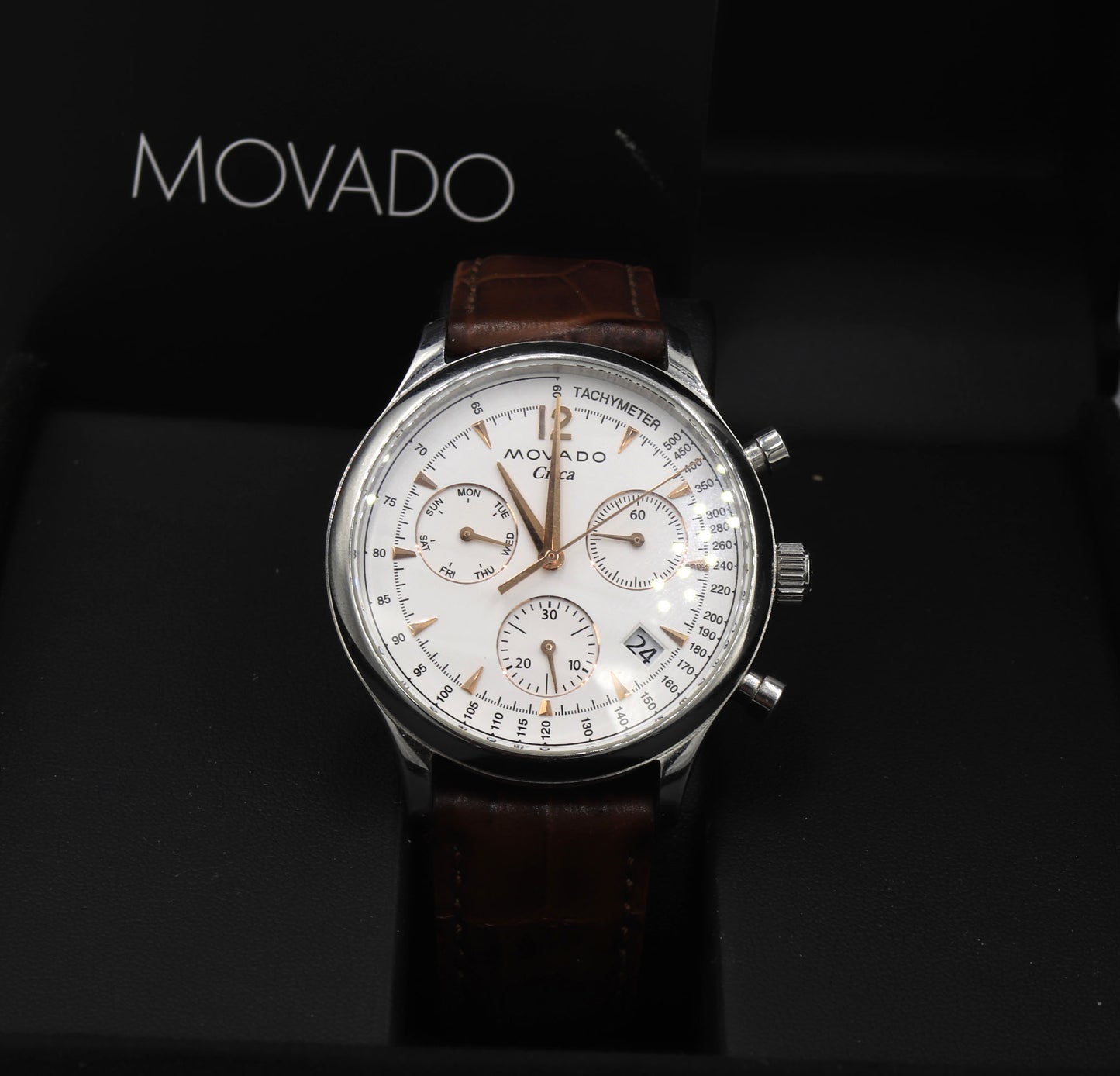 Movado Circa white dial watch with brown leather strap