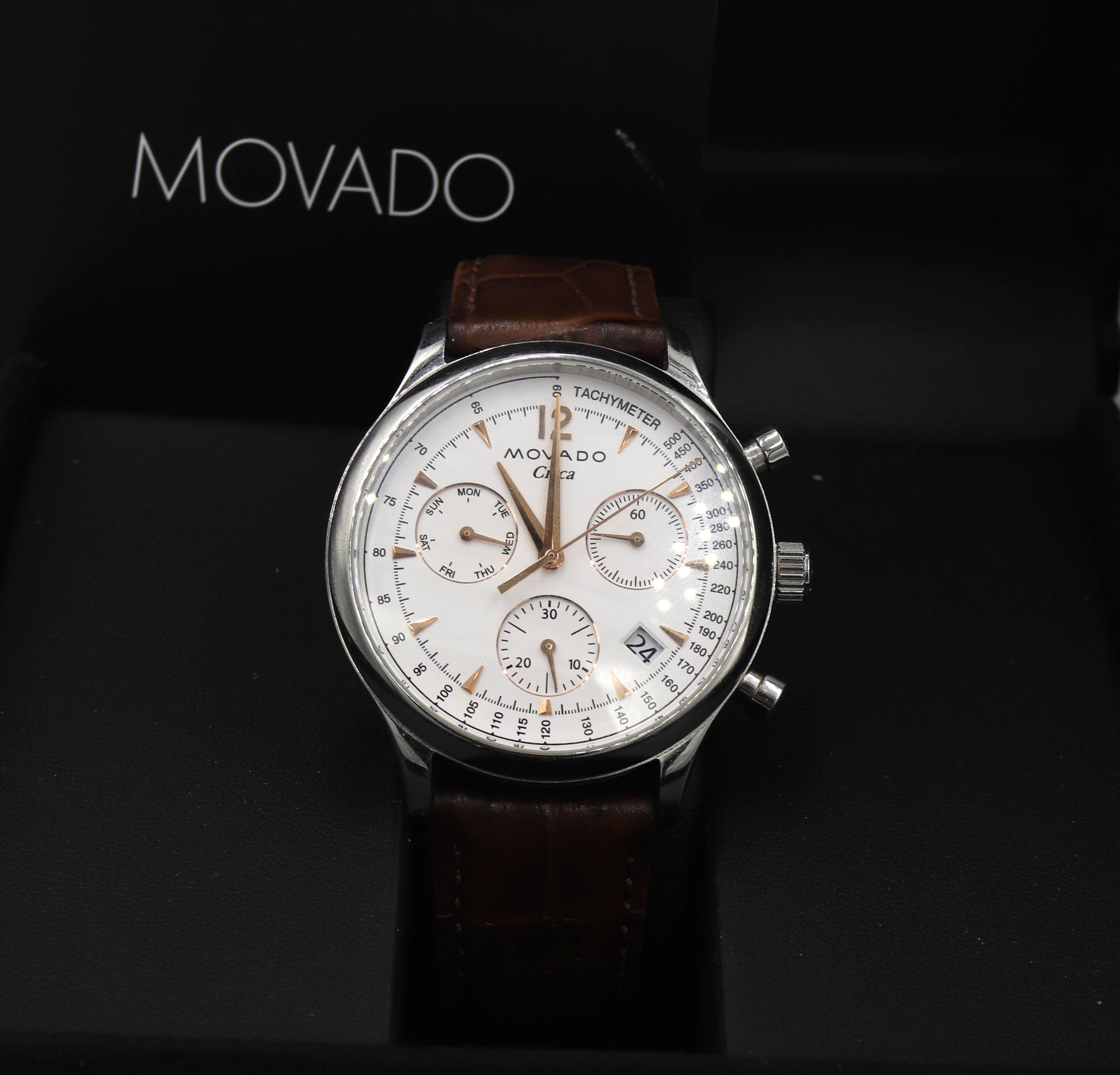 Movado Circa white dial watch with brown leather strap