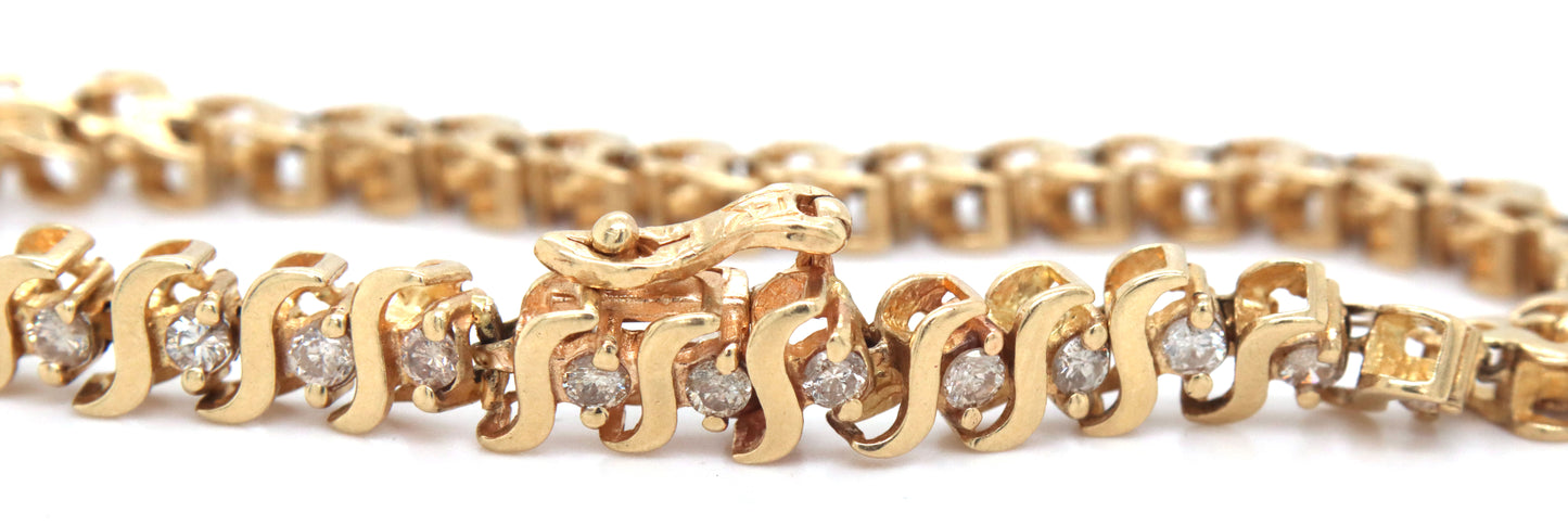 14kt Yellow gold round brilliant cut diamond S link bracelet