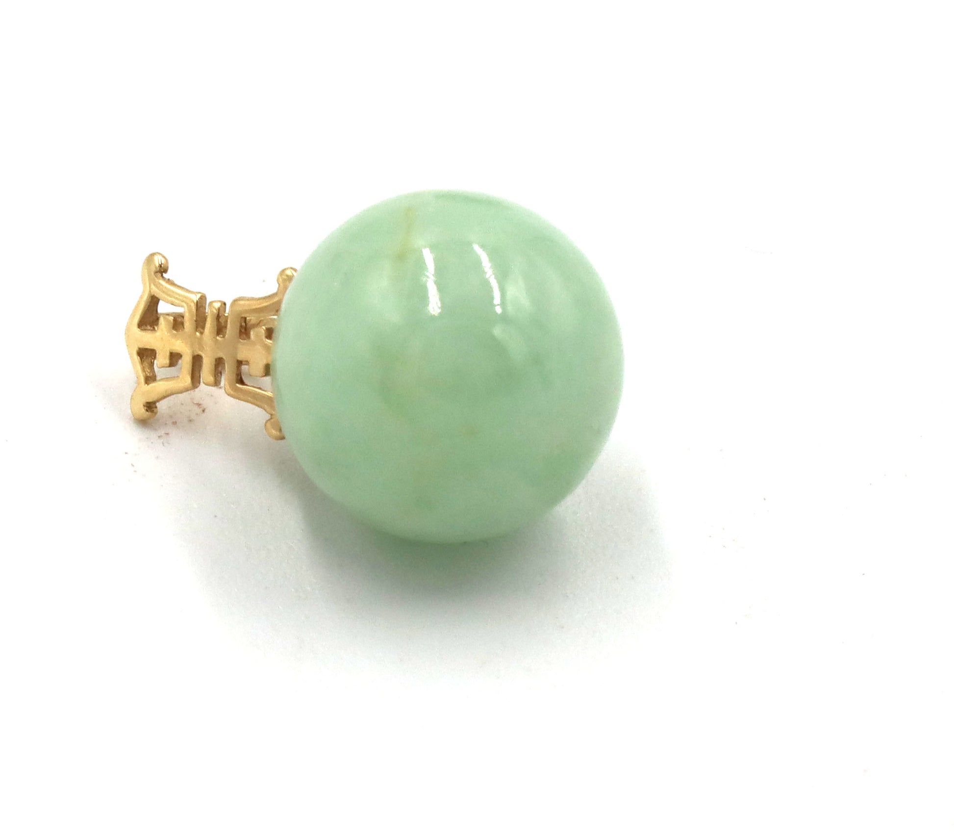 Lot of 14kt yellow gold green jade pendants