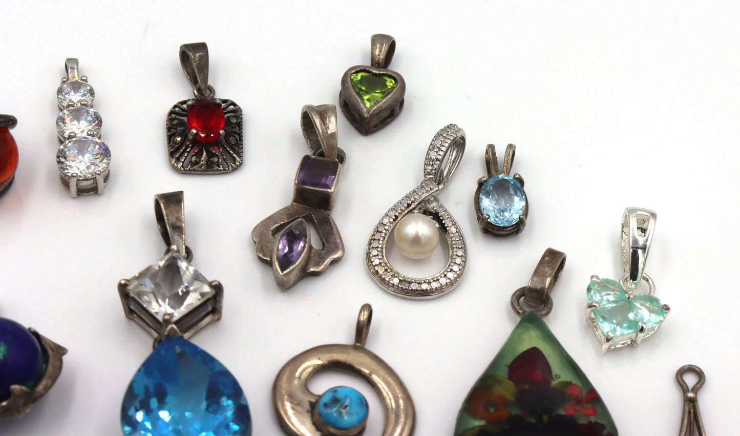 Lot of vintage 925 sterling silver pendants and charms