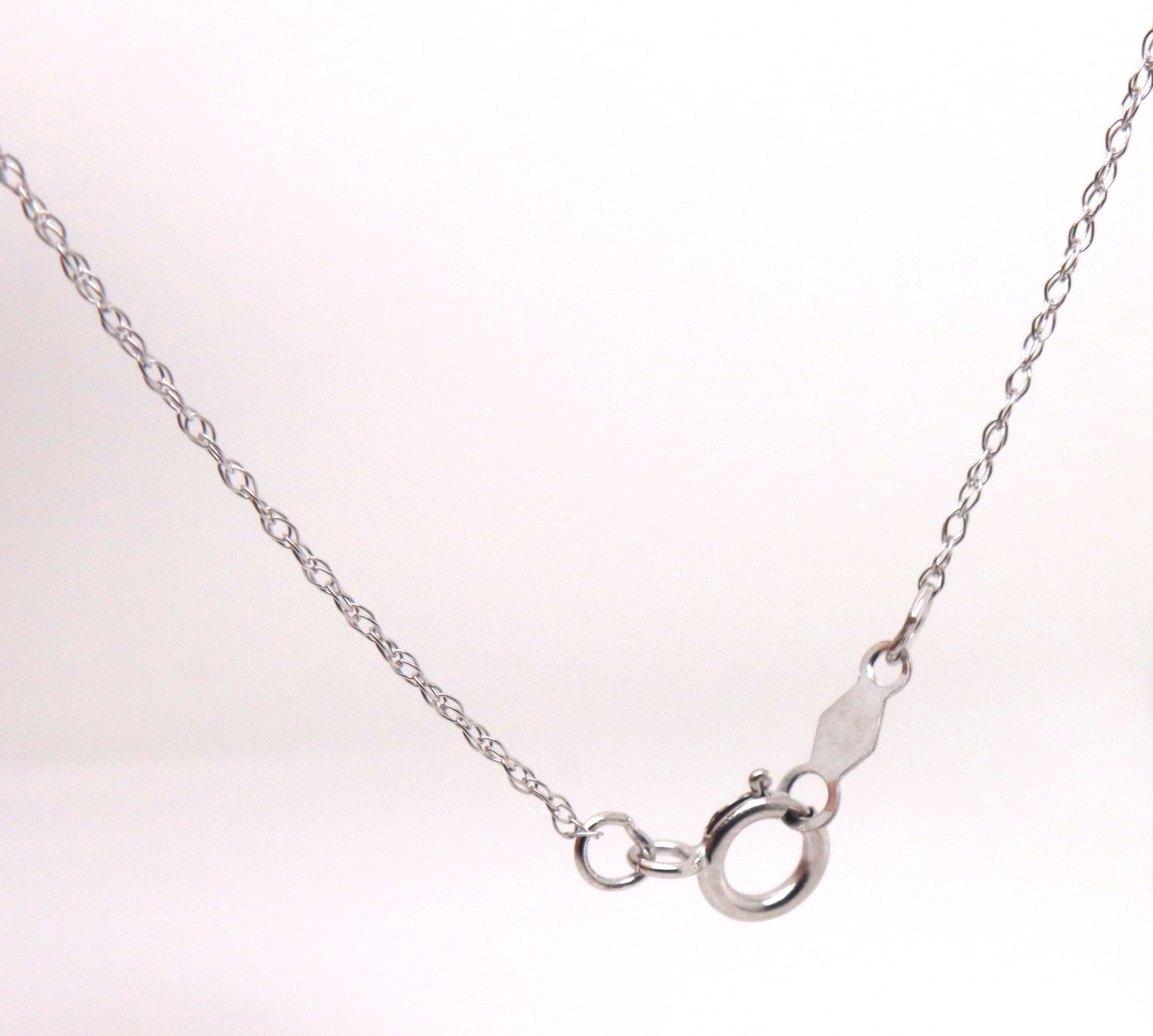 10kt White gold oval tanzanite and diamond dragonfly pendant on chain
