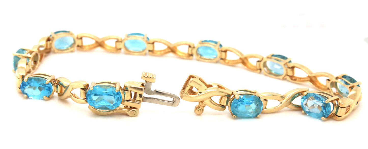 14kt Yellow gold oval blue topaz bracelet