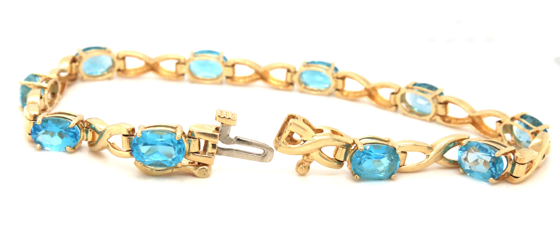 14kt Yellow gold oval blue topaz bracelet