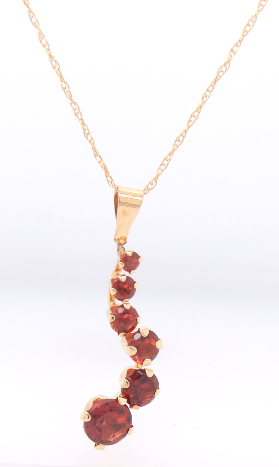 14kt Yellow gold garnet journey pendant on chain necklace