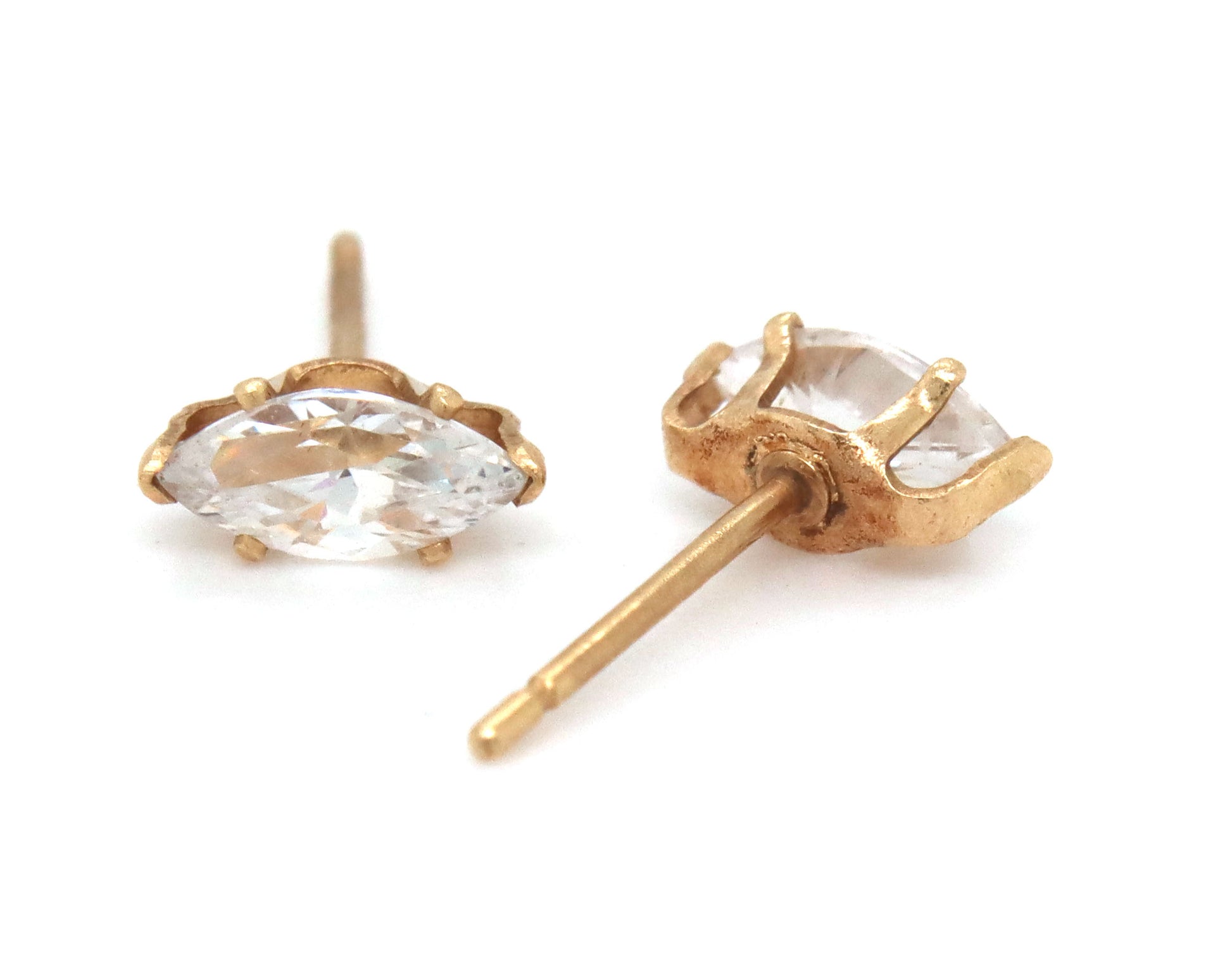 3 Pairs of 14kt yellow gold CZ stud earrings