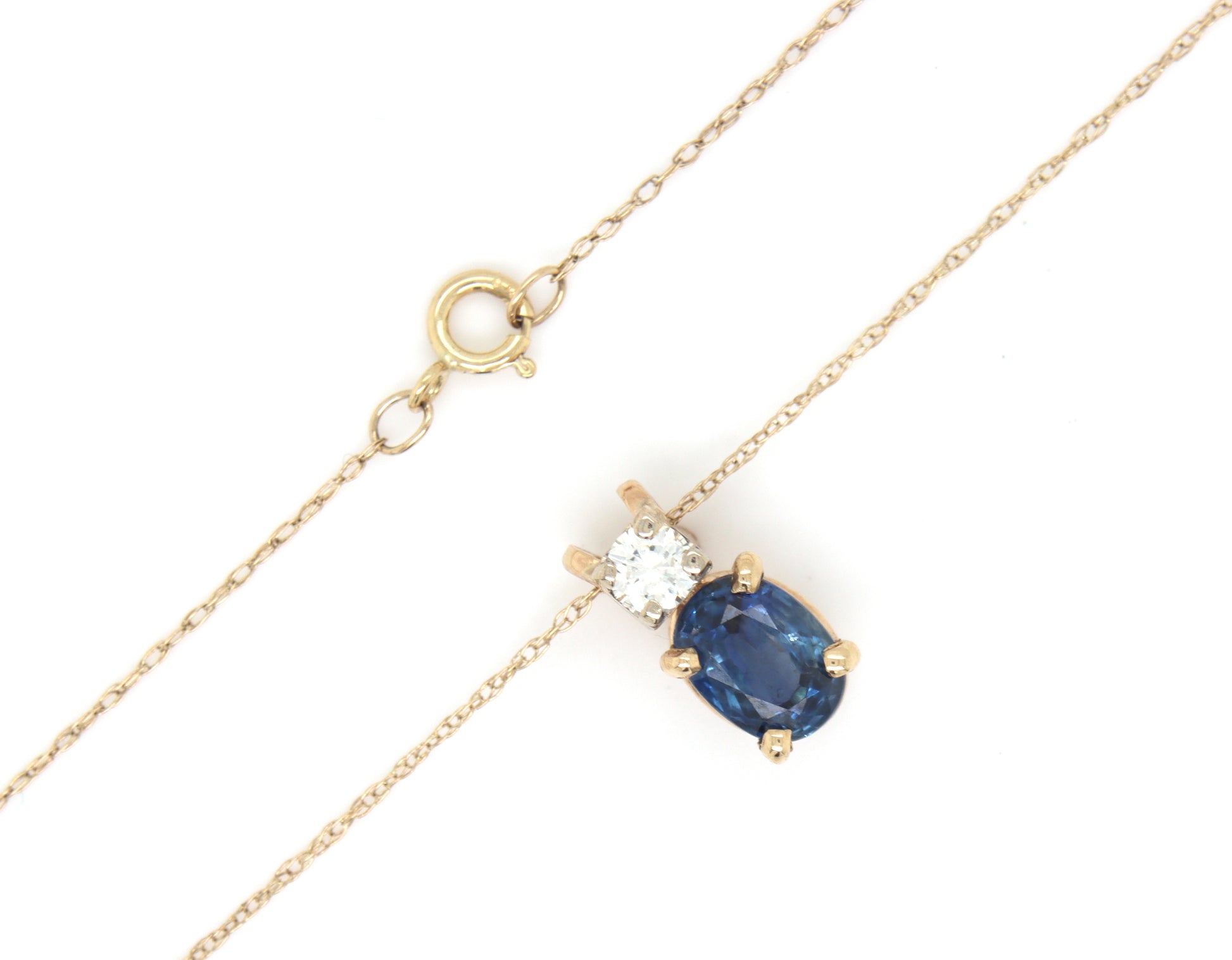 10kt Yellow gold 1.10ct oval sapphire and diamond pendant on chain