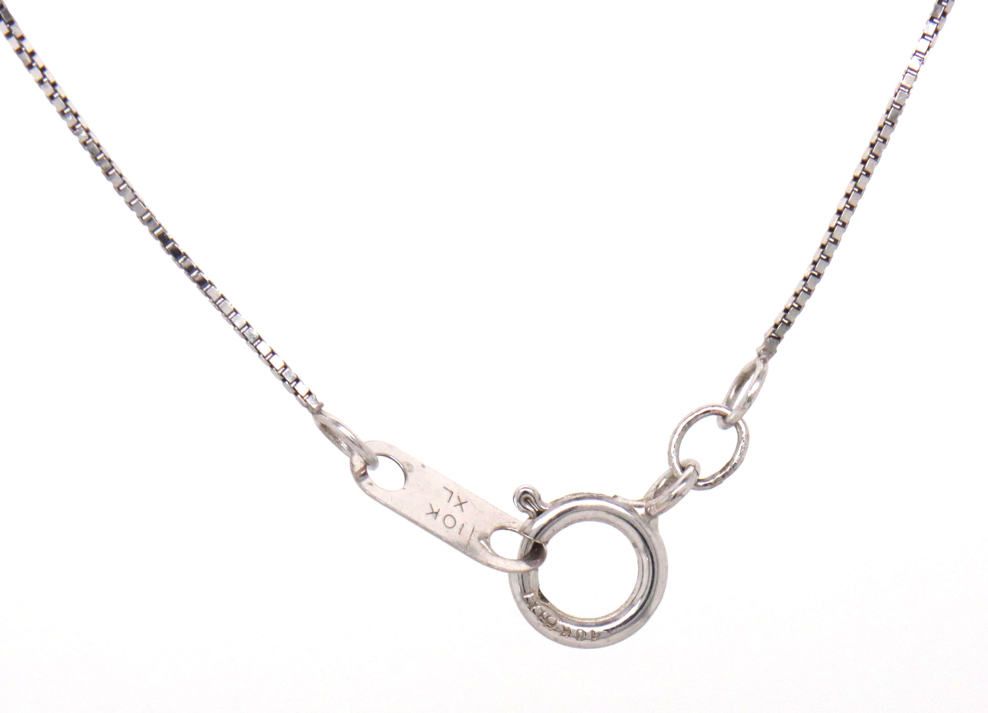 10kt White gold blue sapphire and diamond pendant on chain