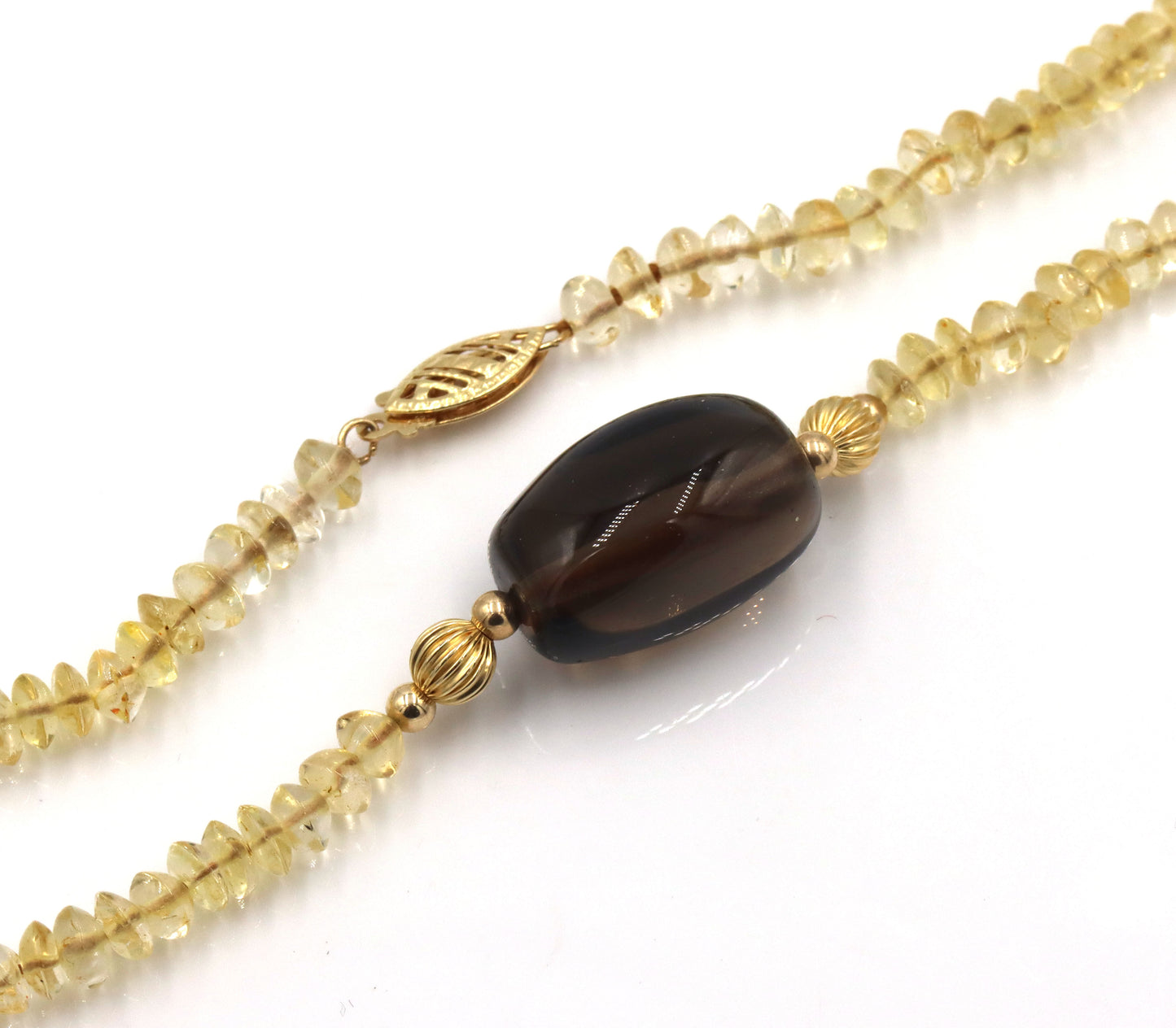 Smokey quartz pendant on citirne beaded necklace with 14kt yellow gold clasp