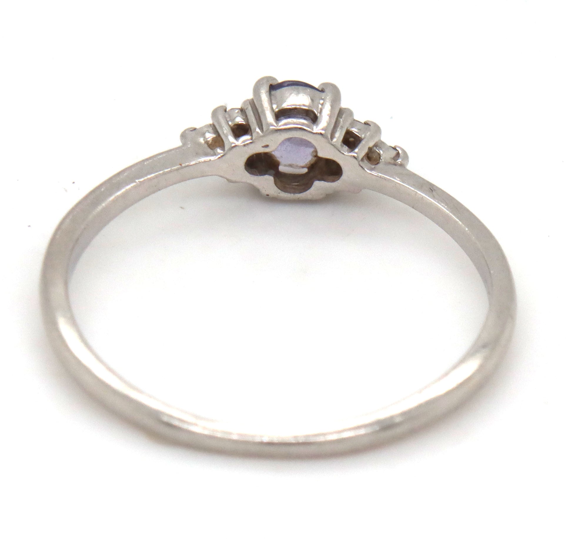 Platinum oval blue star and diamond ring