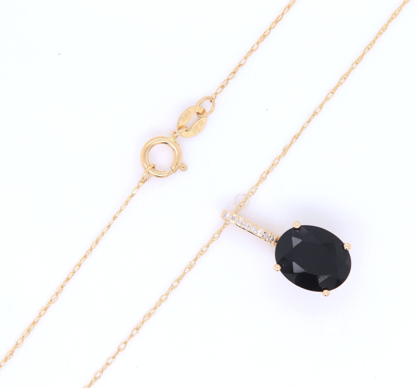 14kt Yellow gold oval black onyx and diamond pendant on chain necklace