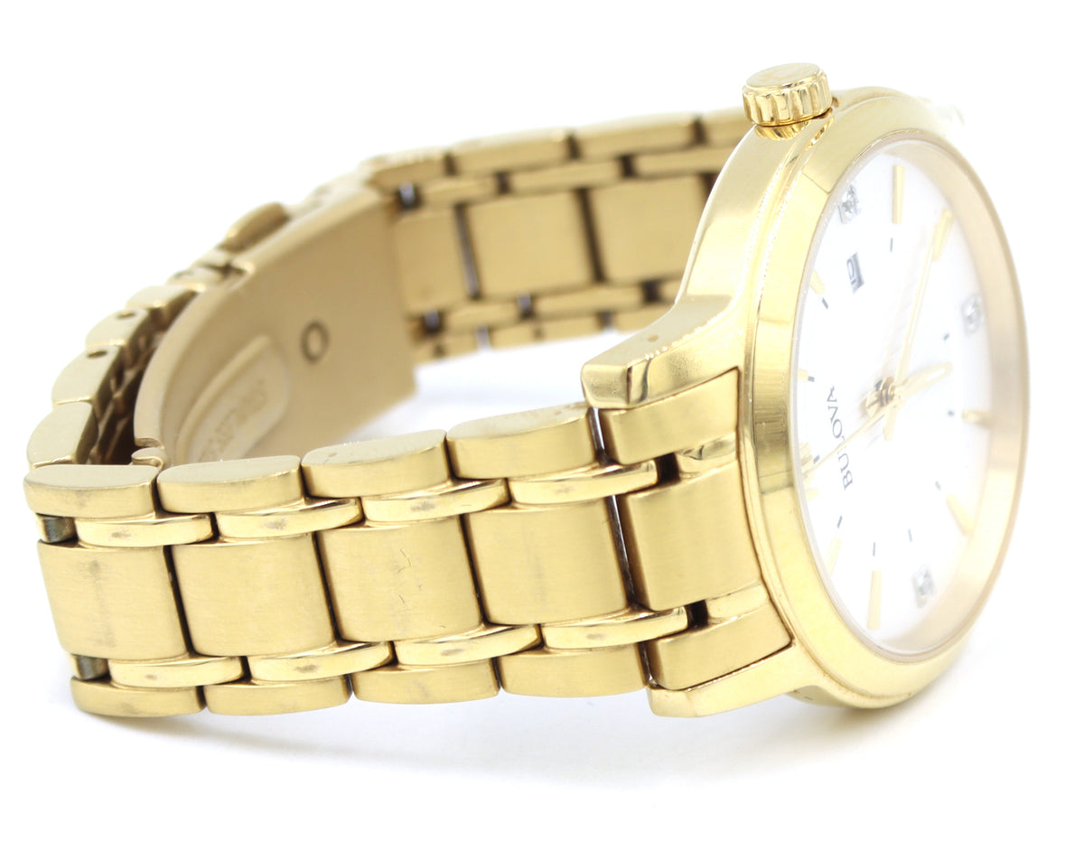 Bulova gold tone quartz round  watch