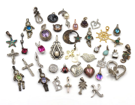 Lot of vintage 925 sterling silver pendants and charms