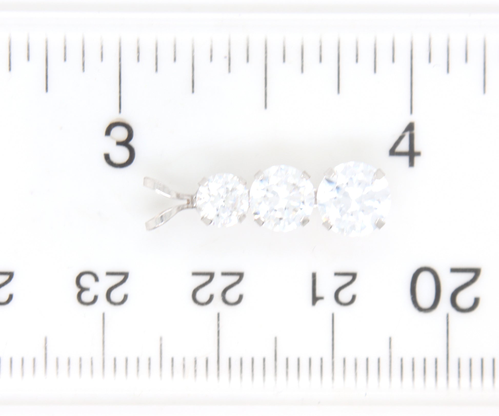 Group lot of 4 cubic zirconia pendants in 14kt