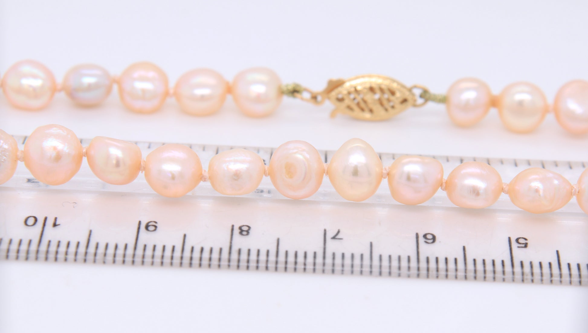 Set of Pink Pearl Necklace, Bracelet and Stud Earrings in Yellow Gold