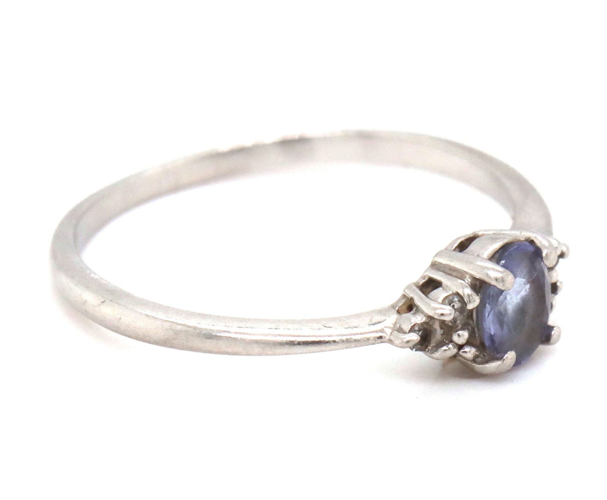Platinum oval blue star and diamond ring