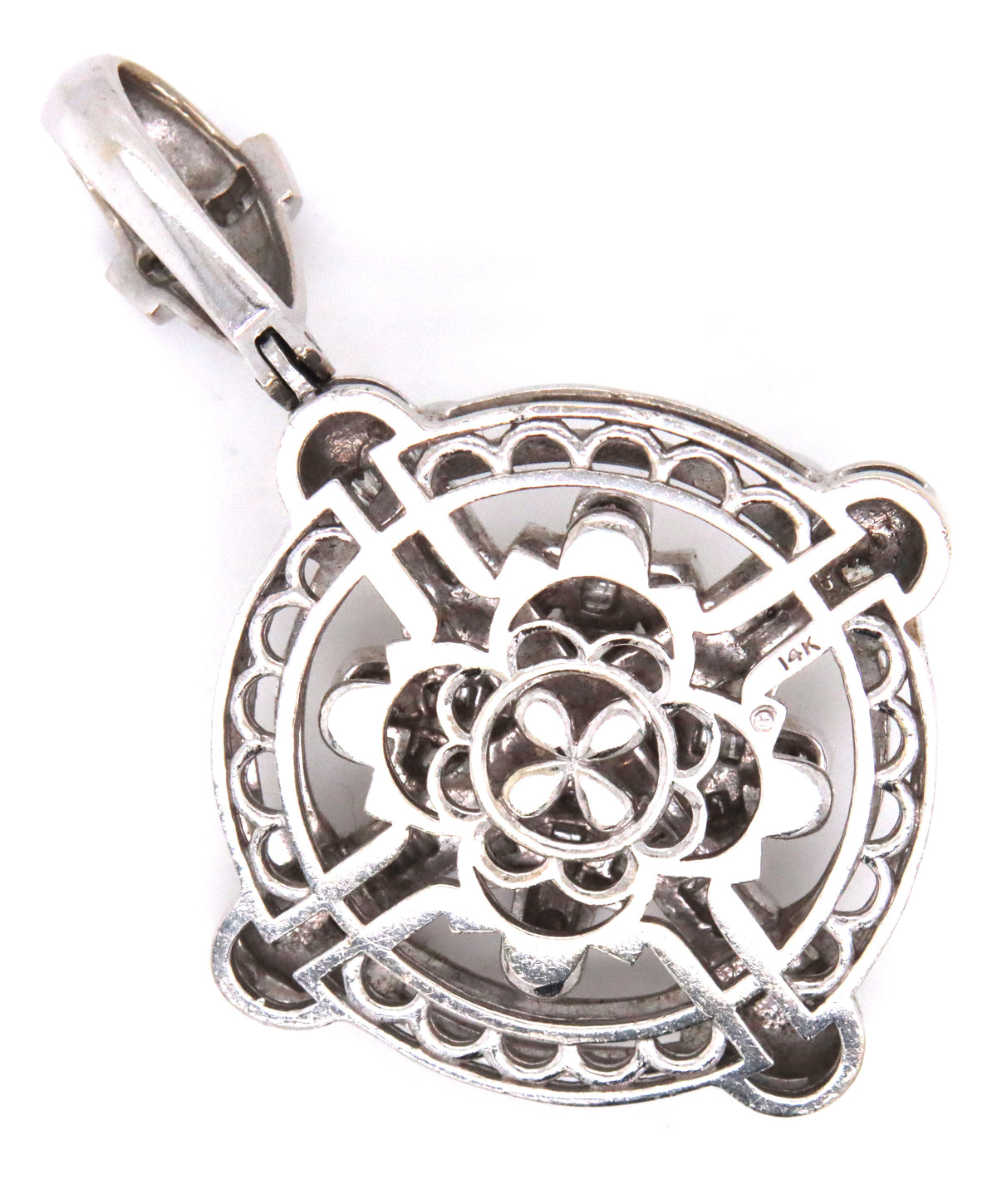 14kt White gold round brilliant and emerald cut diamond pendant