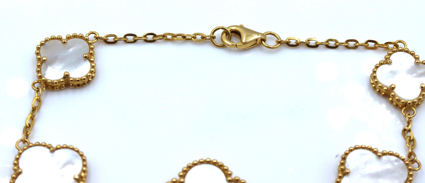 Set of 21kt Yellow gold mother of pearl bracelet and earrings