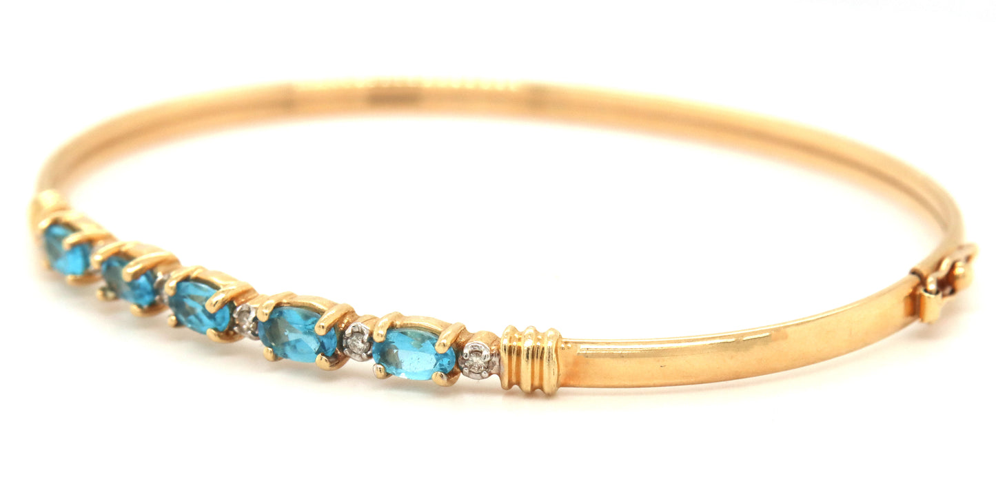 14kt Blue topaz bangle bracelet