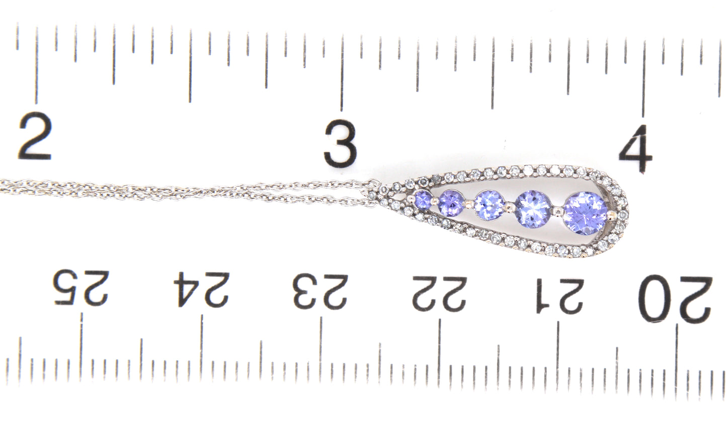 14kt White gold Tanzanite and diamond pendant on chain