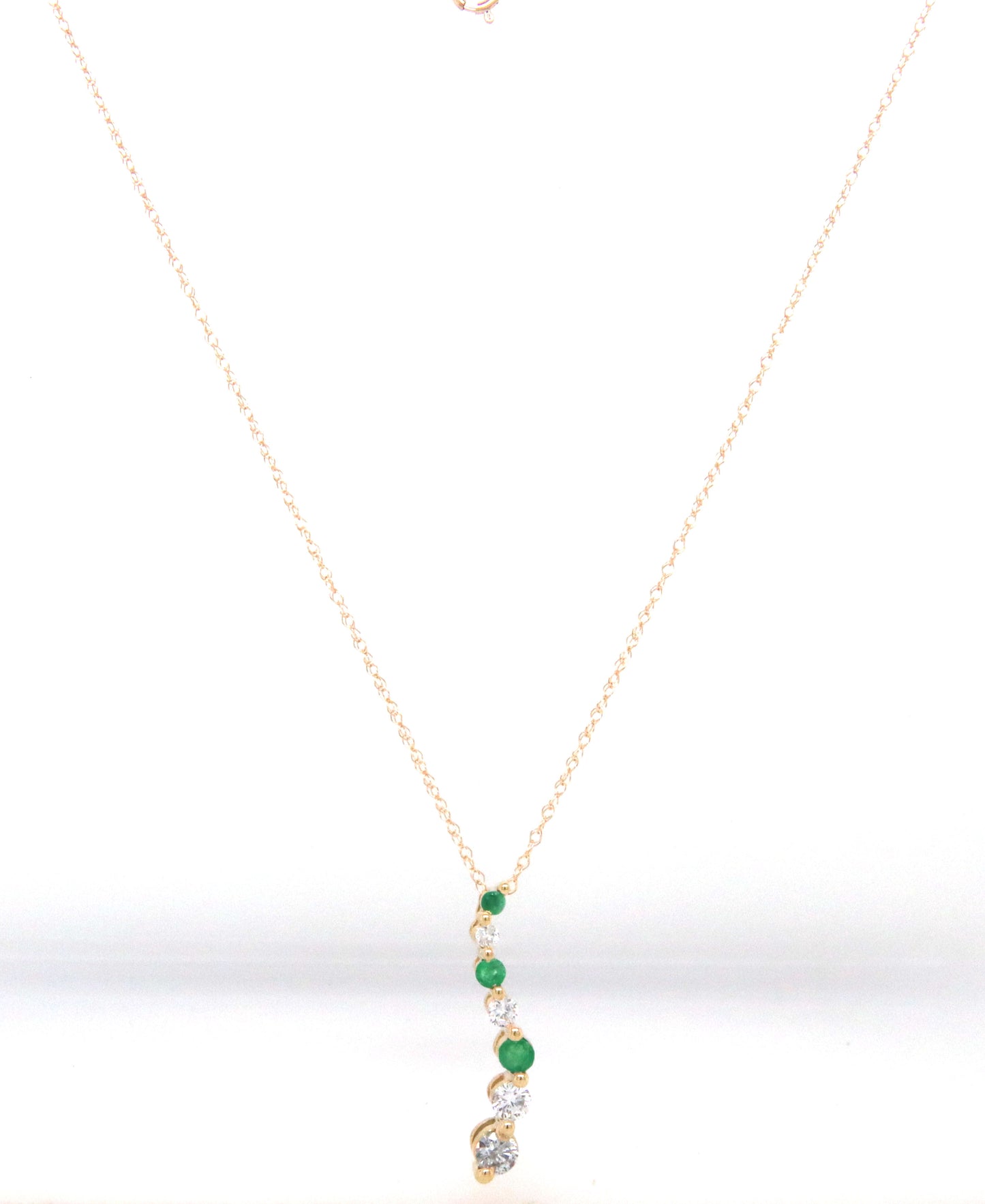 14kt Yellow gold emerald and diamond Journey pendant on chain