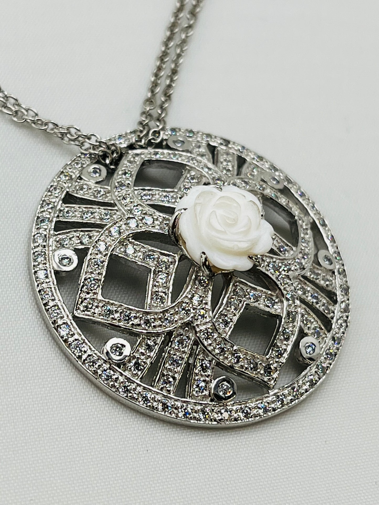 925 Sterling Silver Filigree Round Crystal Pave With carved Rose Motif In Center Pendant With Double
