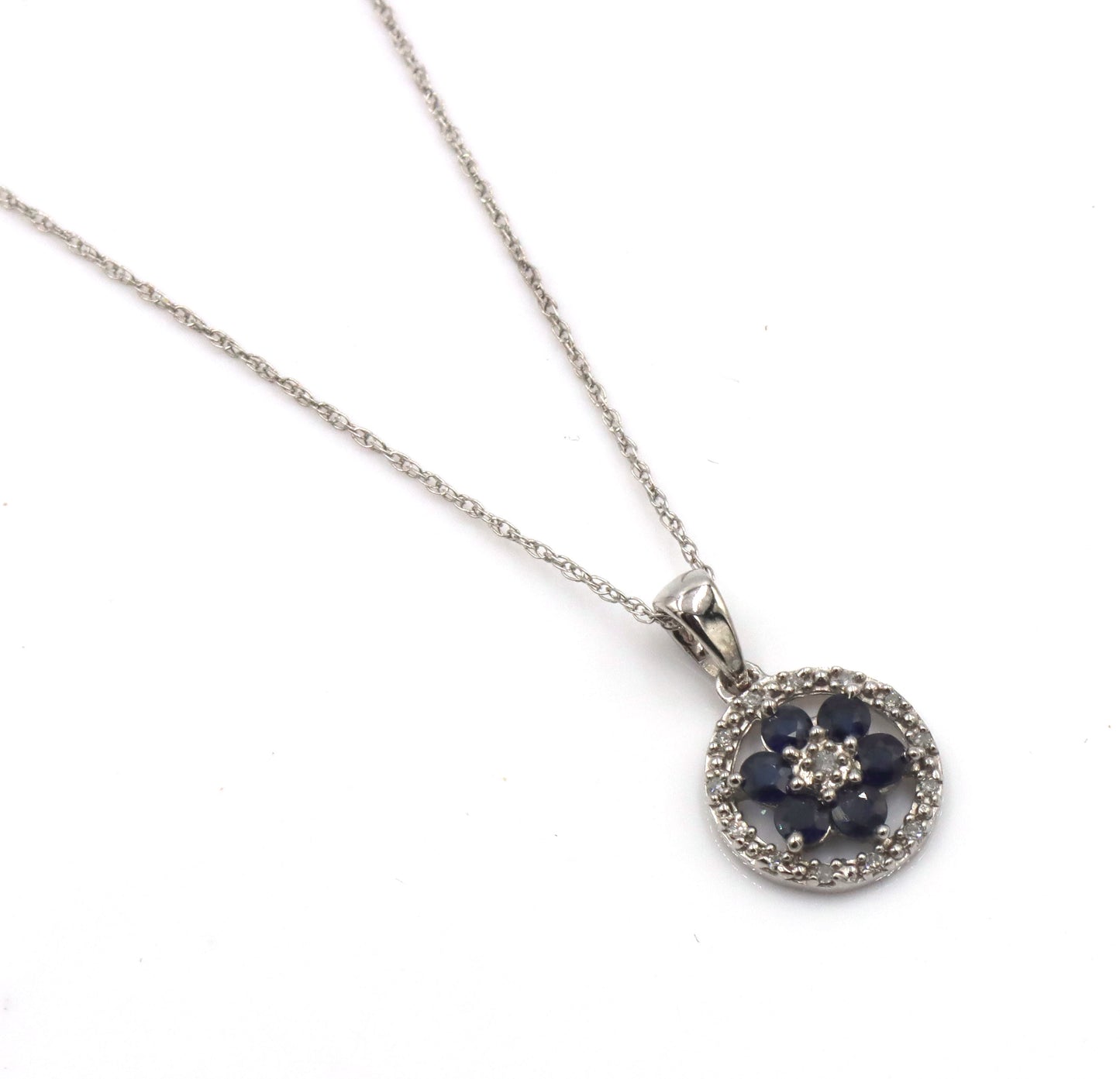 10kt White gold sapphire and diamond halo flower pendant on chain