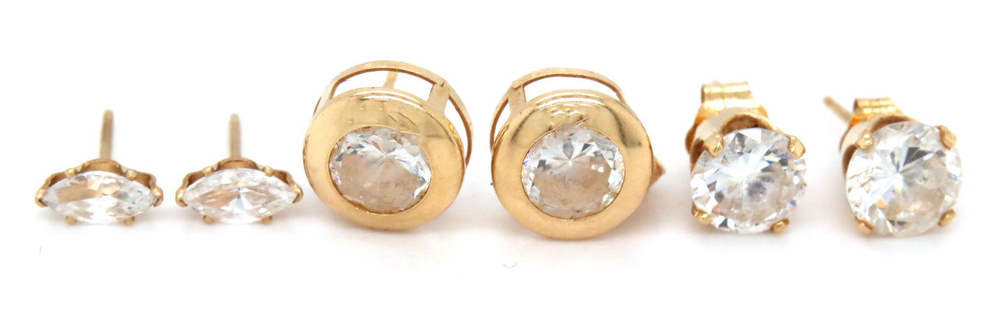 3 Pairs of 14kt yellow gold CZ stud earrings