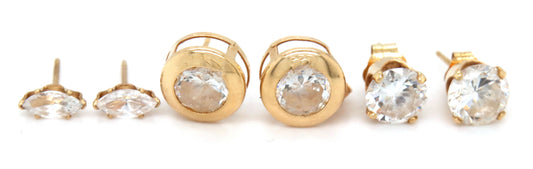 3 Pairs of 14kt yellow gold CZ stud earrings