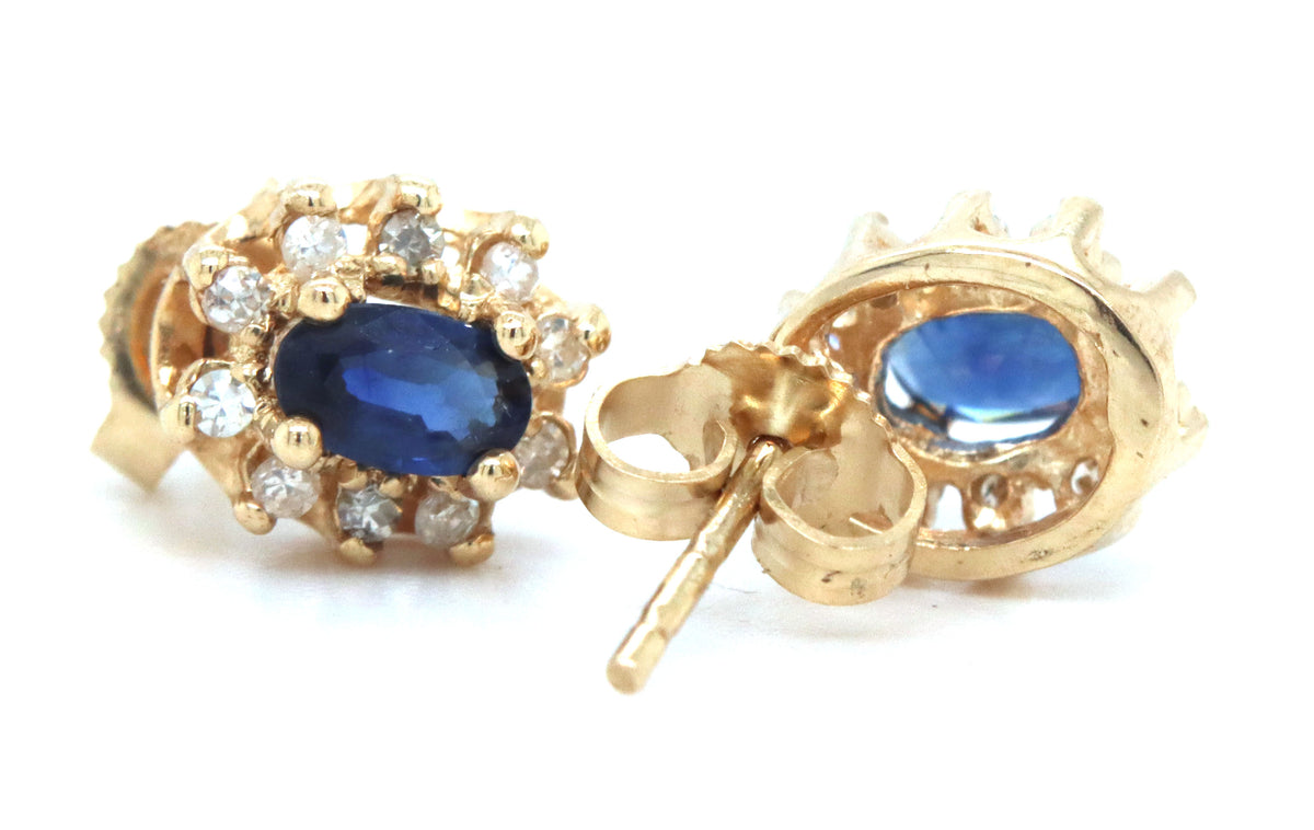 14kt Yellow gold oval sapphire and diamond halo earrings