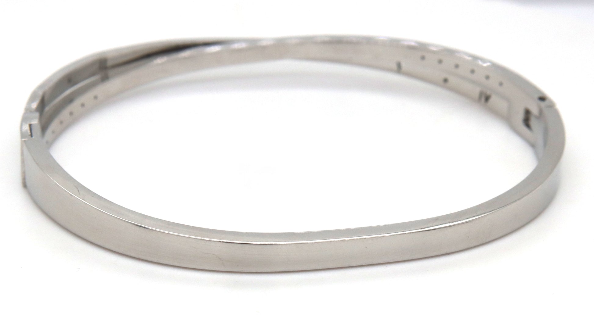Stainless steel twisted bangle