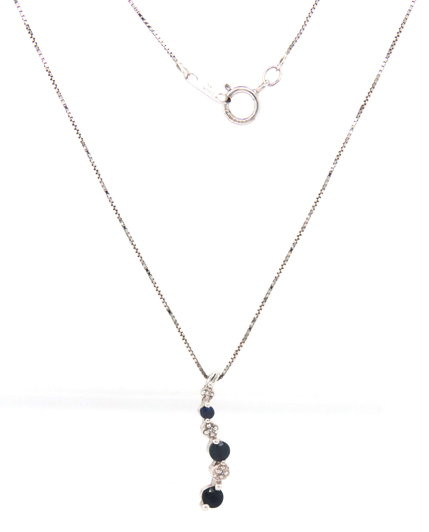 10kt White gold blue sapphire and diamond pendant on chain