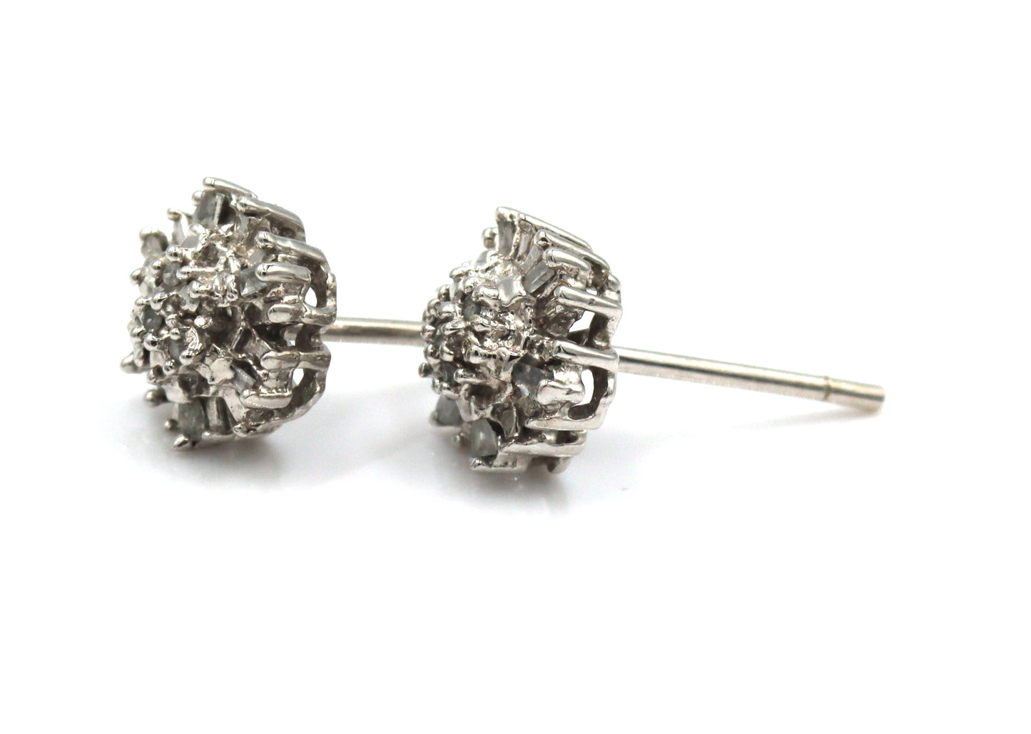 10kt White gold diamond flower style stud earrings