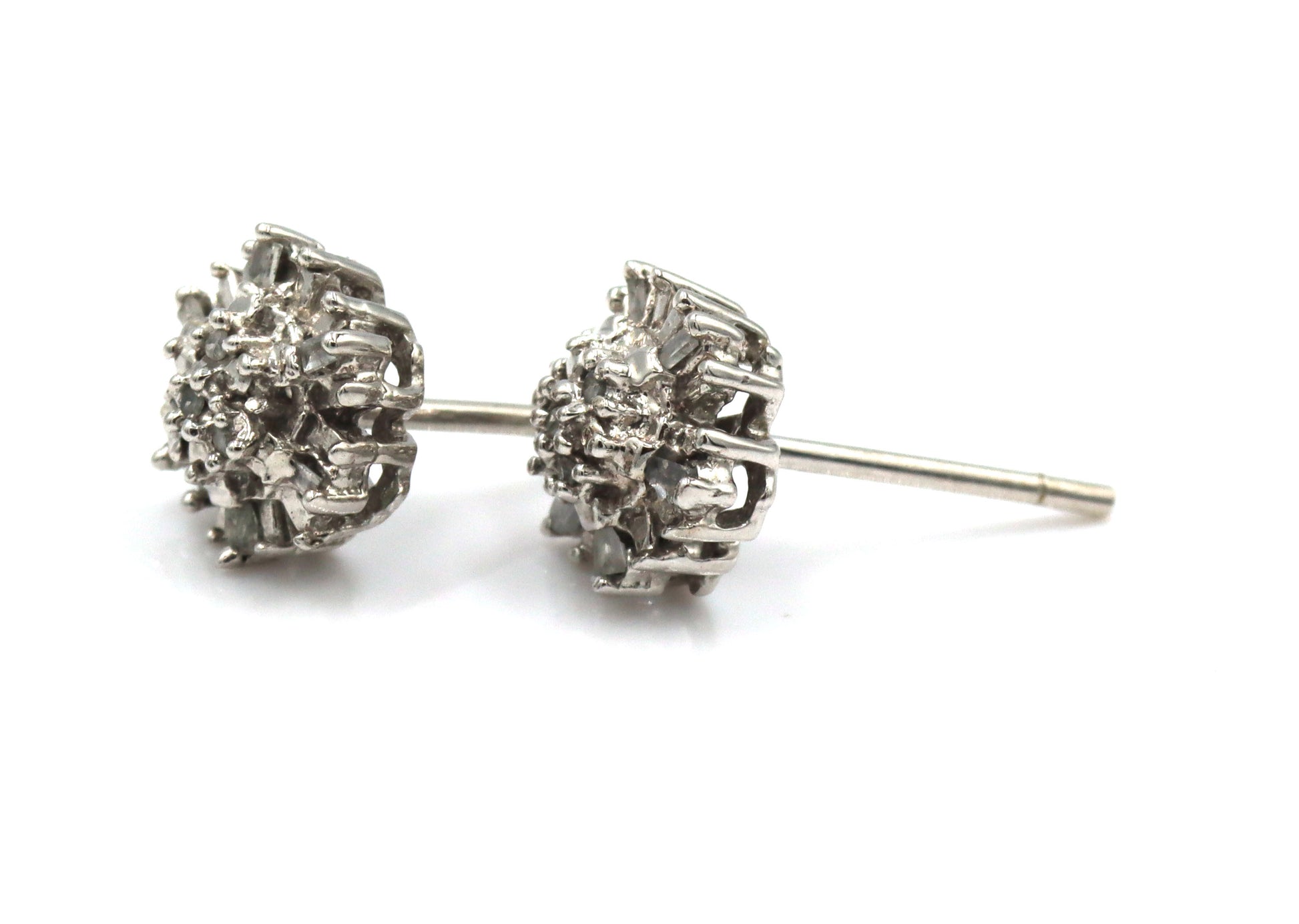 10kt White gold diamond flower style stud earrings