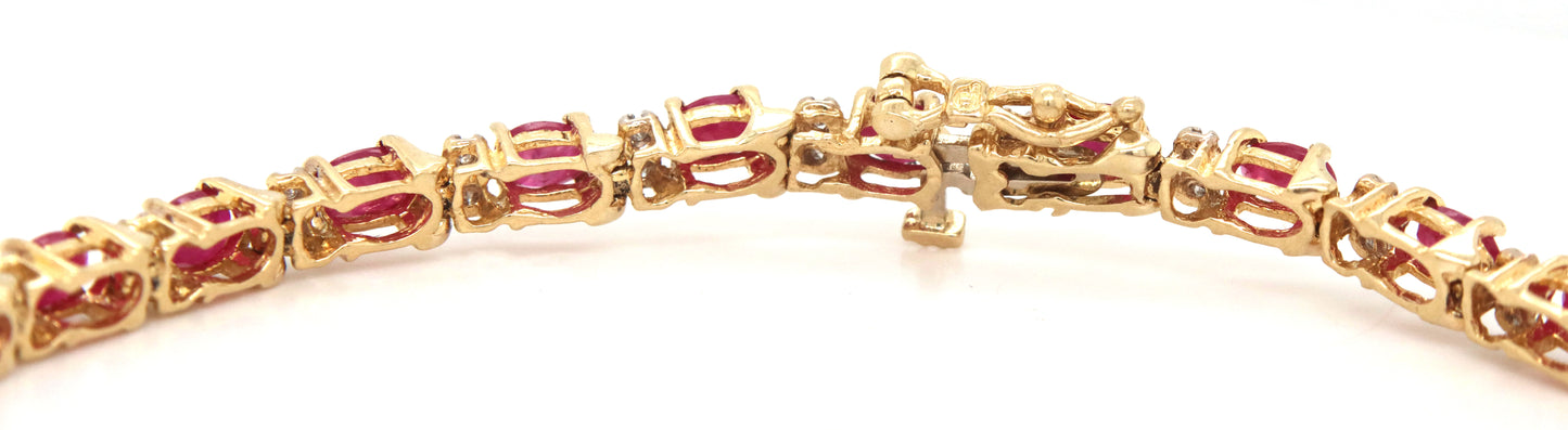 14kt Yellow gold ruby and diamond link bracelet