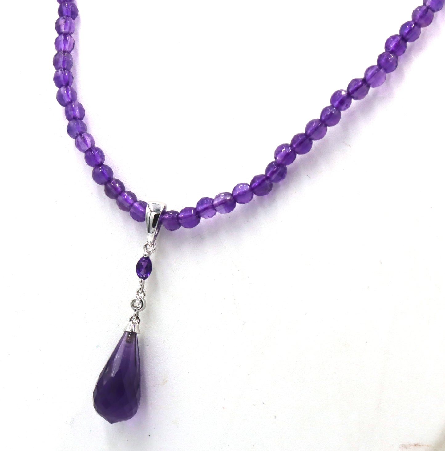 Amethyst pendant on beaded necklace