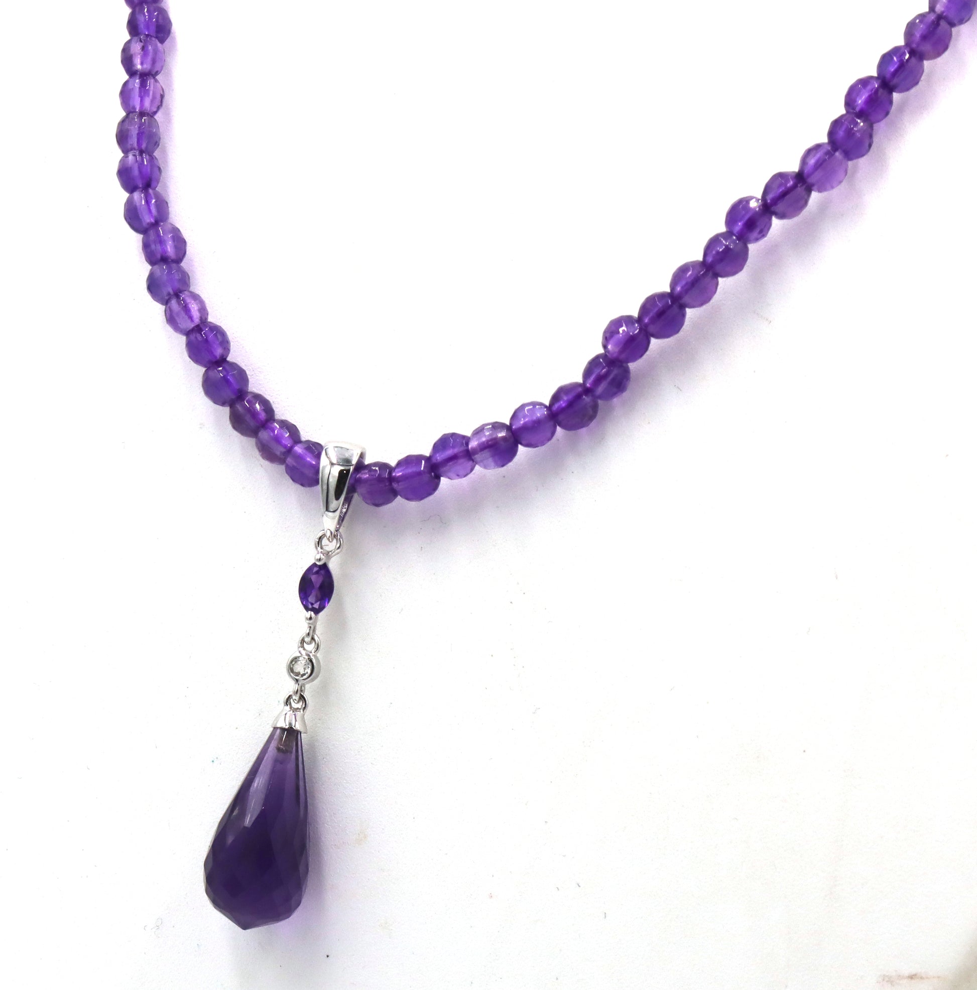 Amethyst pendant on beaded necklace
