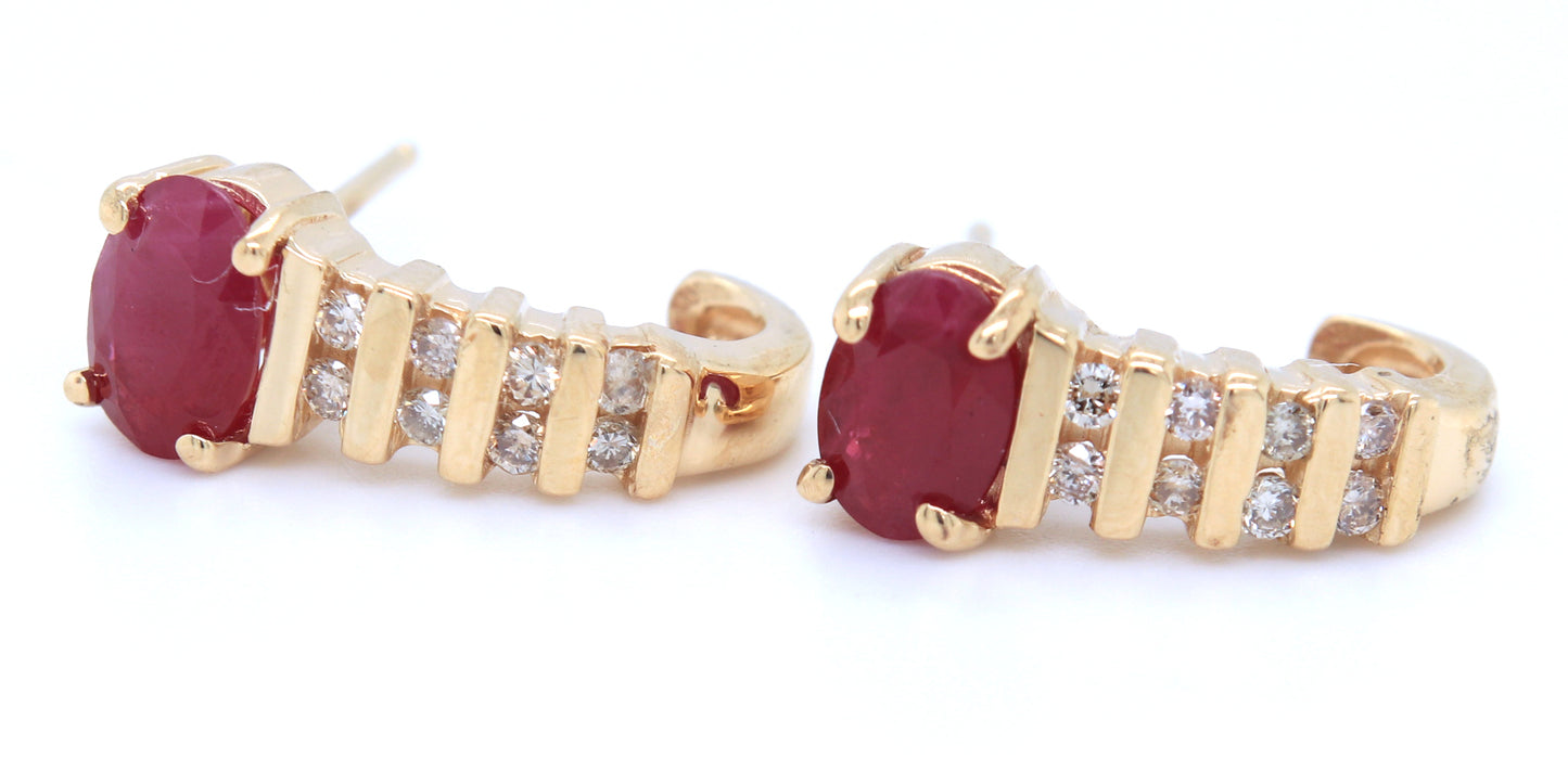 14kt Yellow gold oval ruby and diamond accent earrings