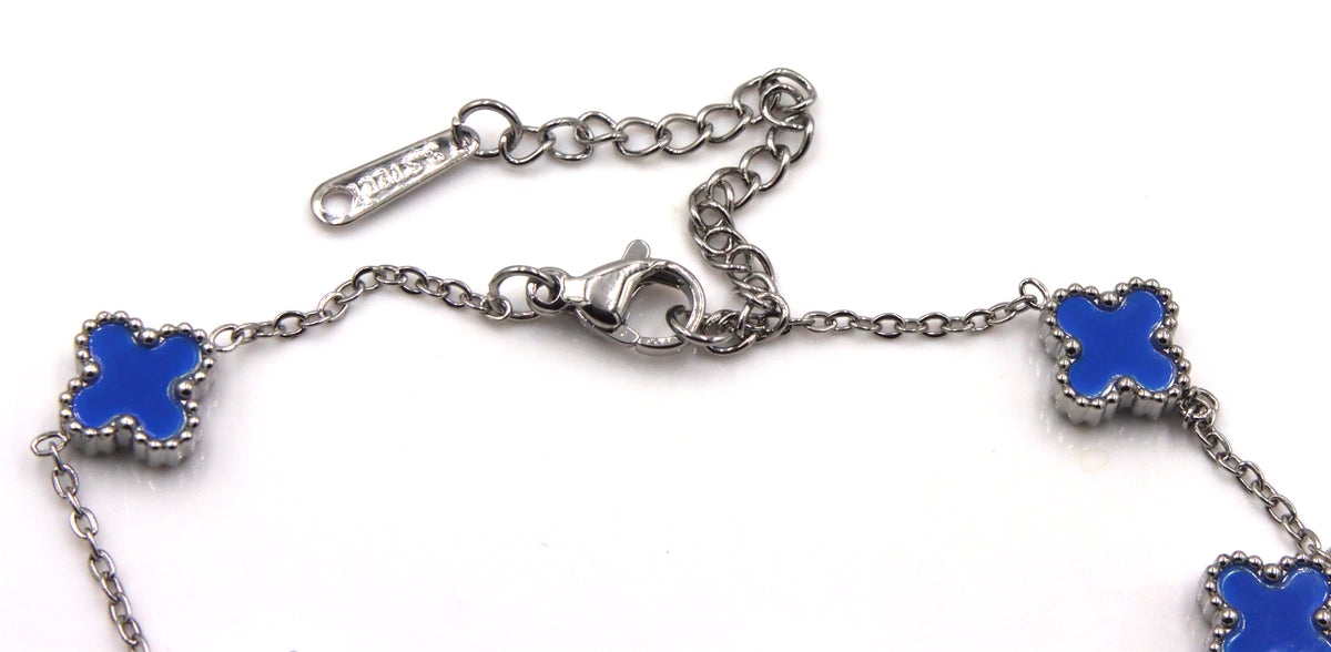Stainless steel blue stone clover station bracelet