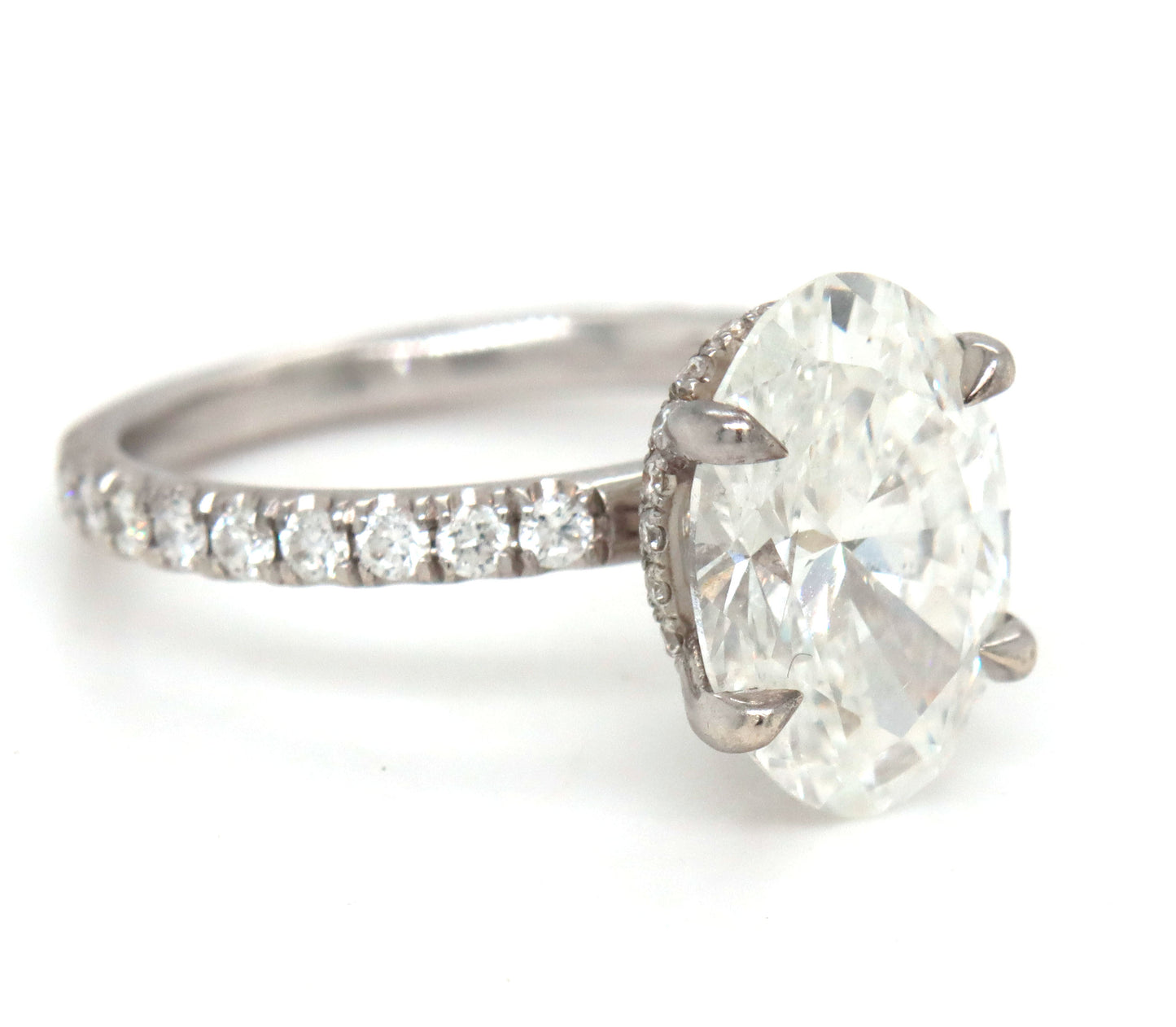 14kt White gold 3.15ct oval lab grown diamond in micro pave ring