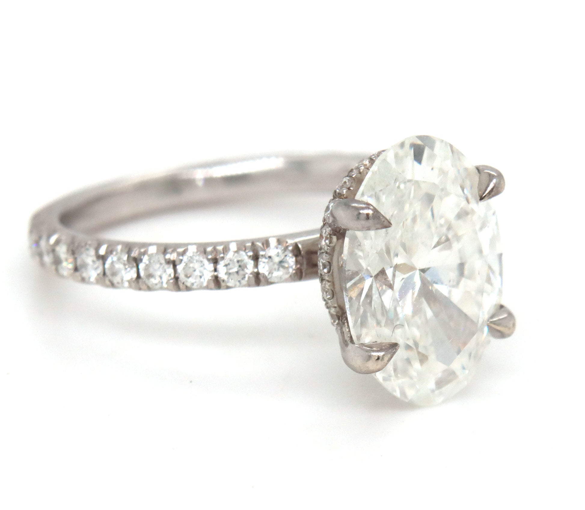 14kt White gold 3.15ct oval lab grown diamond in micro pave ring