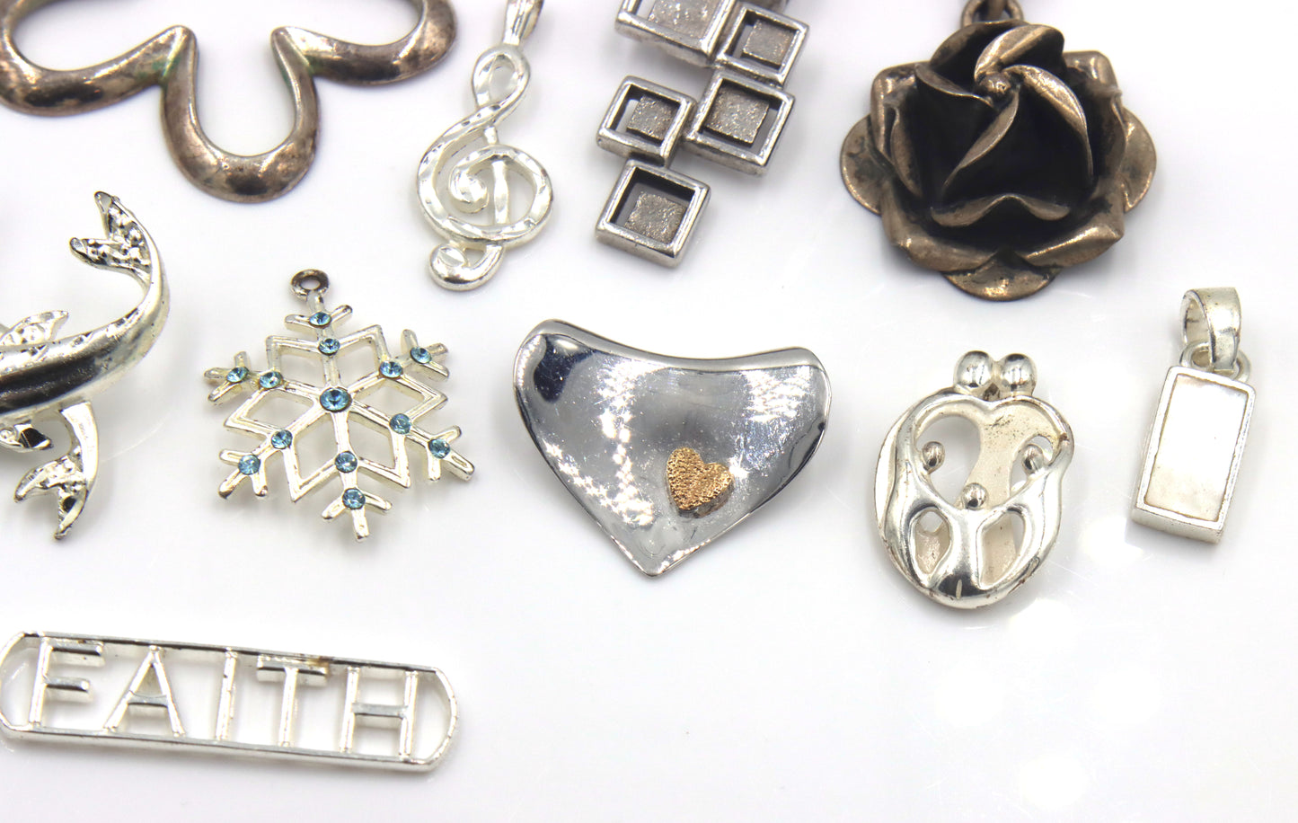 Lot of vintage 925 sterling silver pendants